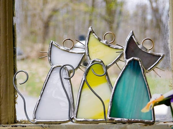 Back side with tails of stained glass cat suncatchers