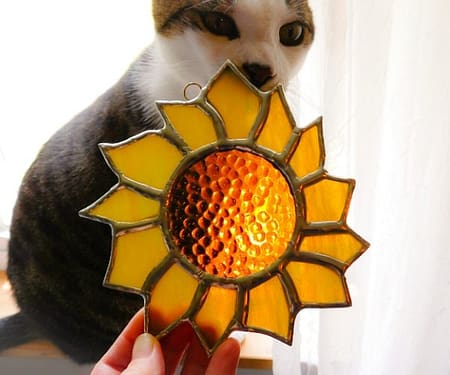 cat admiring stained glass sunflower by Mountain Woman Products