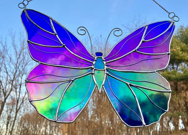 Stained Glass Iridescent Cobalt Blue Butterfly Mountain Woman Products