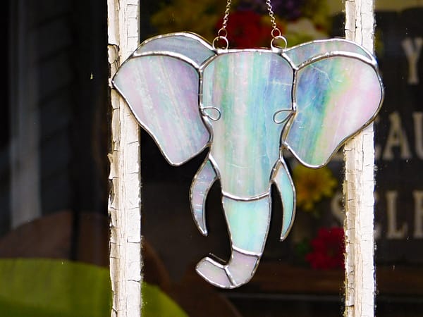Iridescent White Elephant in Stained Glass Mountain Woman Products
