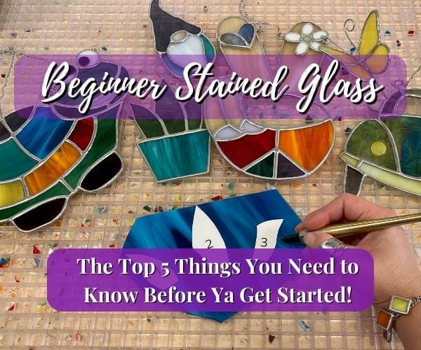 Top 5 things you should know before getting started in stained glass with finished suncatchers and a hand cutting glass Mountain Woman Products